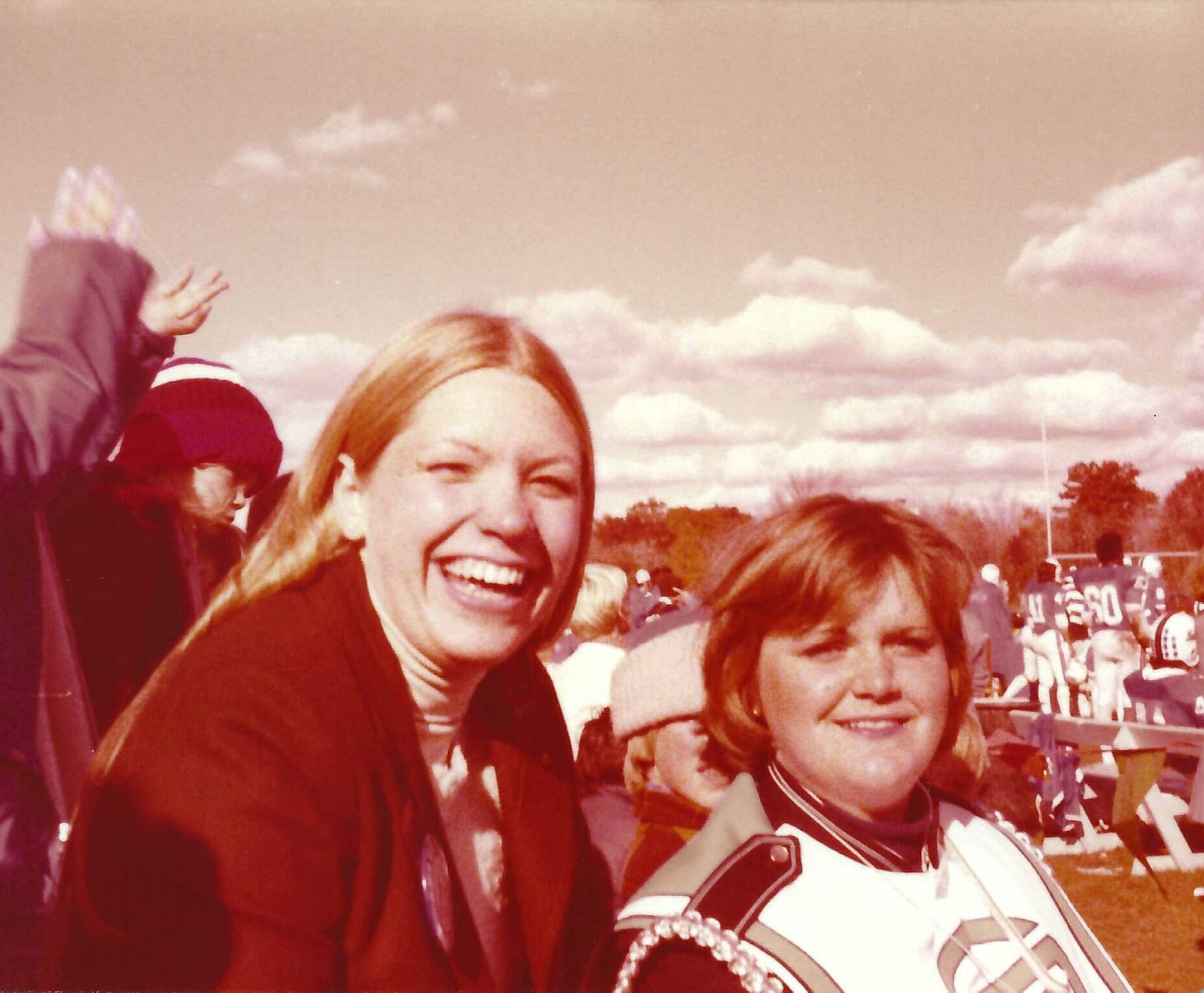 Maris Timmer Tracy ’78, left, and Kathleen (Ure) Bell ’81 are pictured at Homecoming 1978, prior to receiving their prizes for the Lyrics Contest.